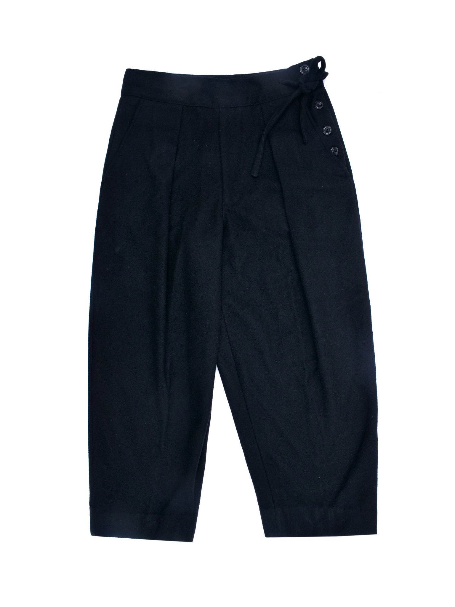 Black pants with buttons on a white background