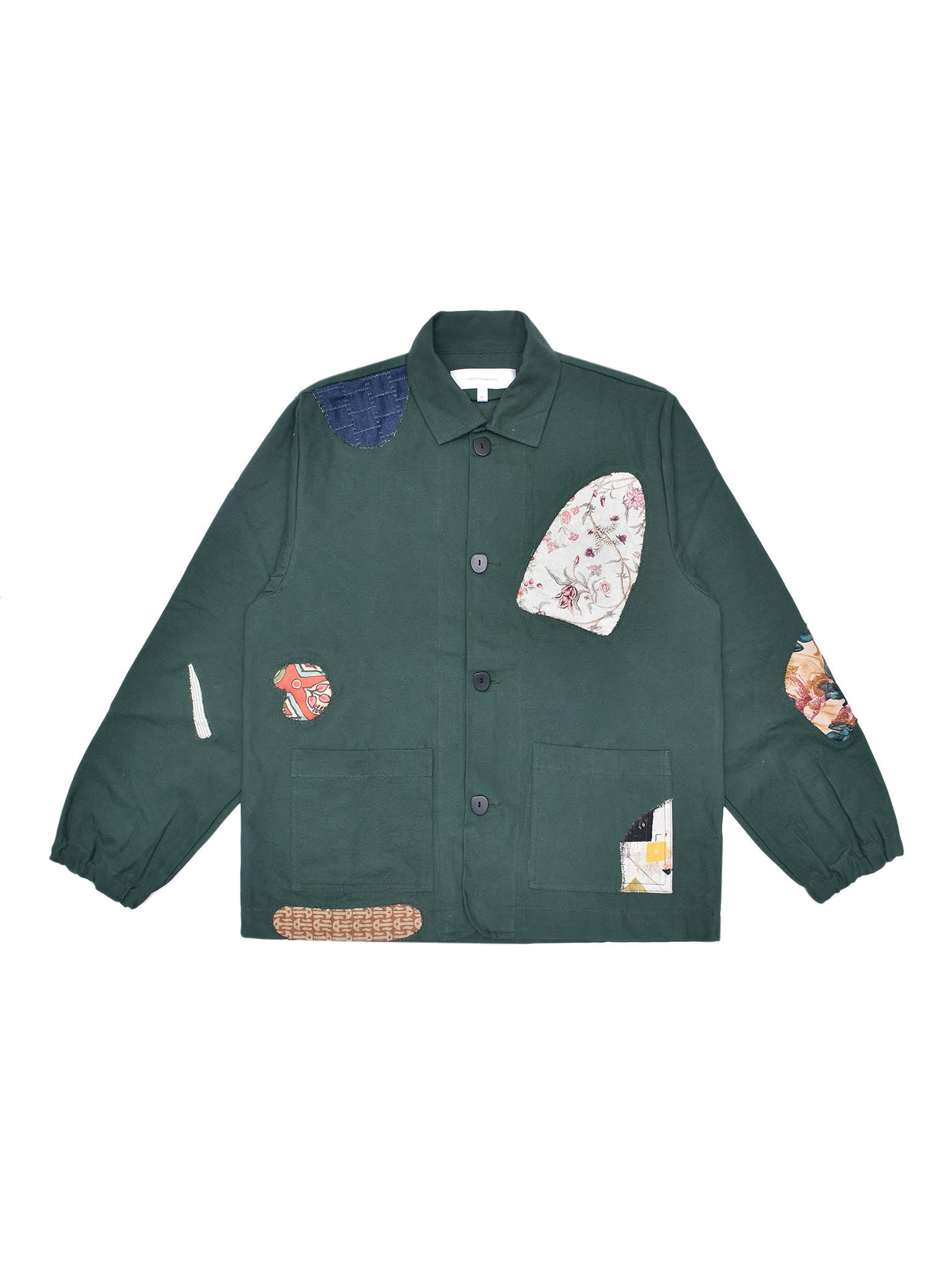 Green jacket with patterned patches on a white background