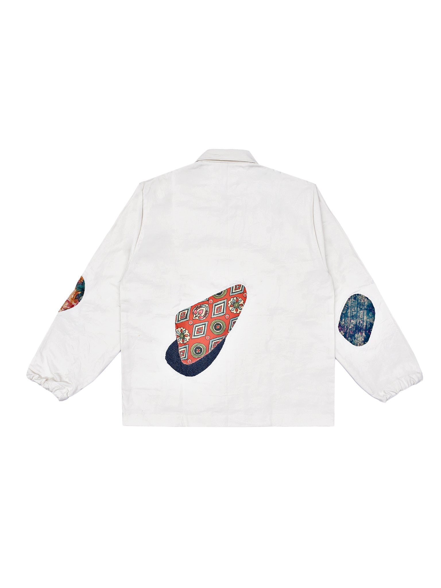 White shirt with colorful patterned sleeves on a white background