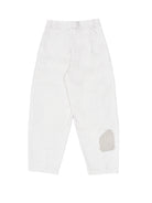 White pants with a patch on a white background