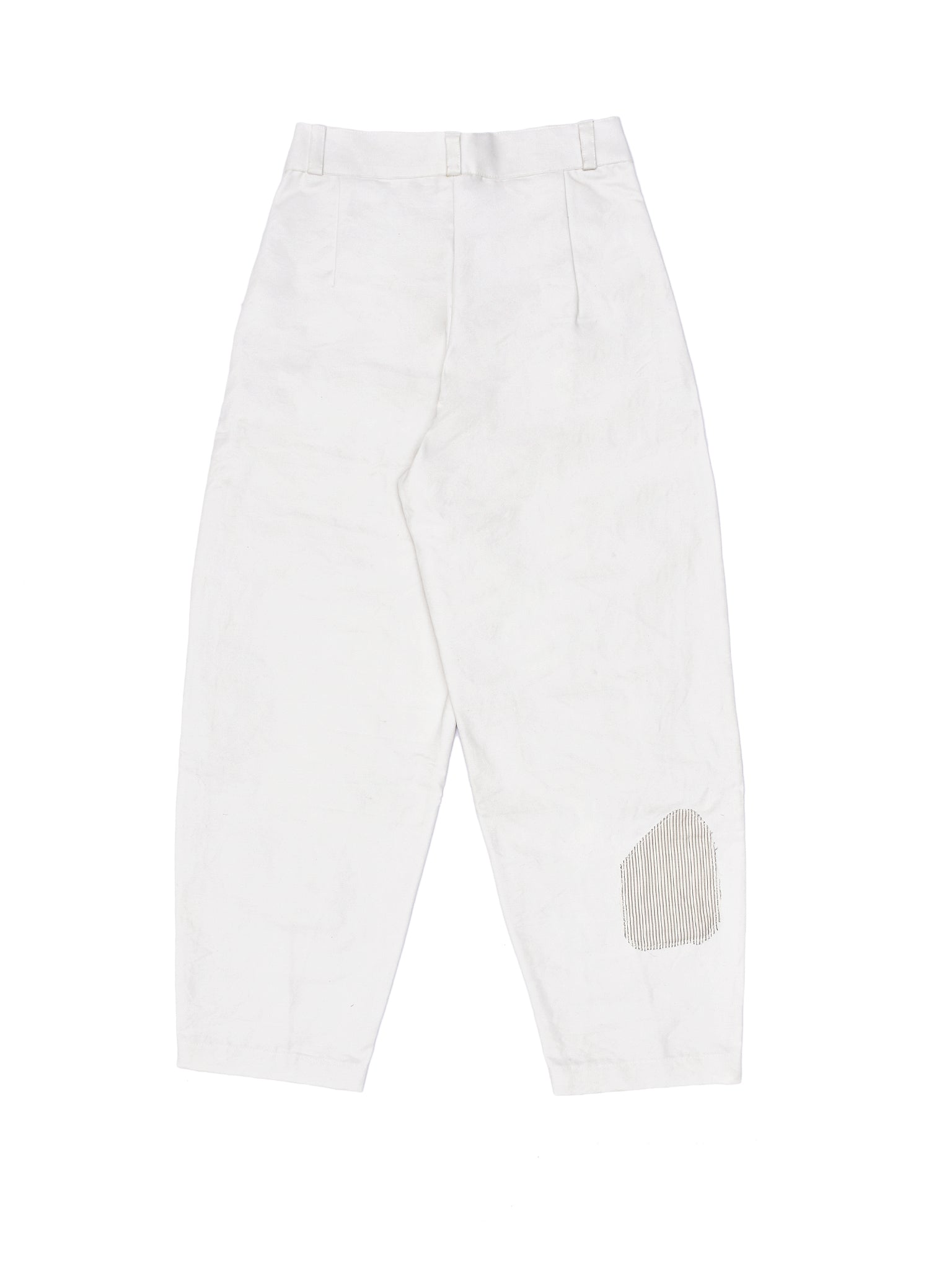 White pants with a patch on a white background