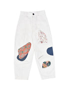White pants with colorful patches on a white background