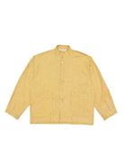 Pale mustard jacket on a white background