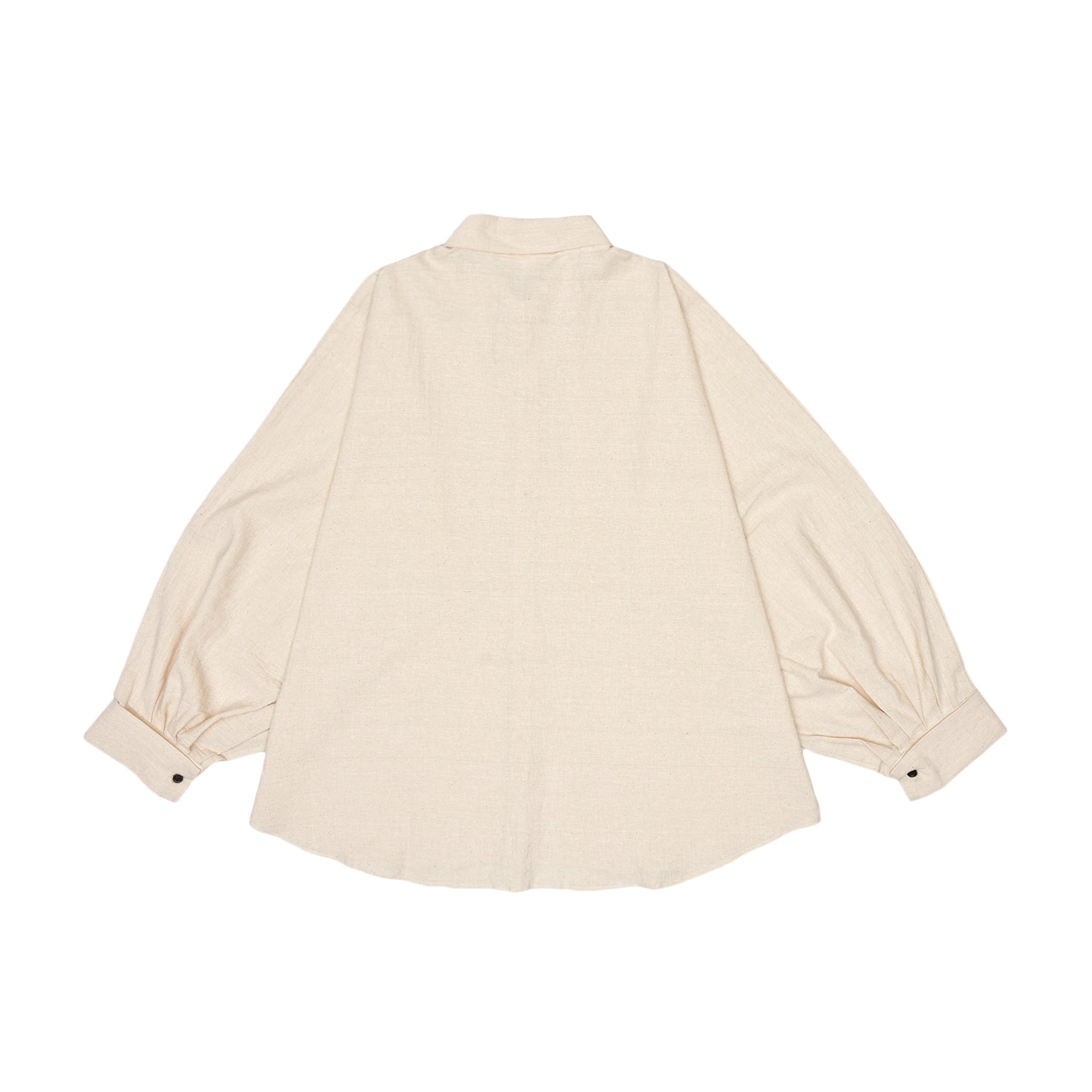 Beige blouse with balloon sleeves on a white background