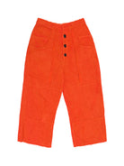 Orange corduroy pants with black buttons on a white background
